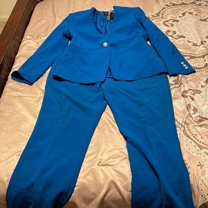 Blue limited suit. Pants is size 16 long and jacket is size lg